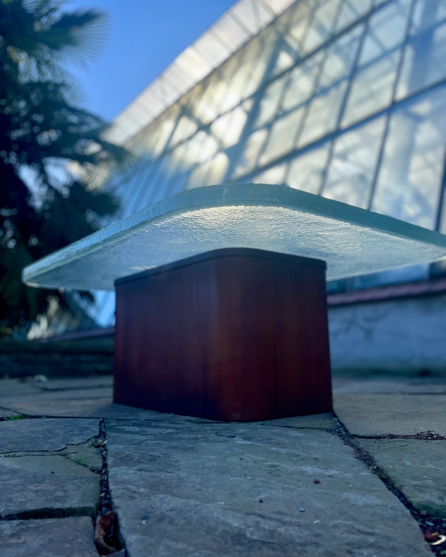 A close view of a glass-topped table.
